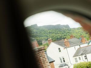 a view of the mountains from a castle window at Somerton House Rooms Only in Belfast