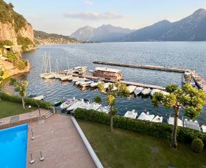 a view of a marina with boats in the water at Lake Como Serenity Suite in Lierna