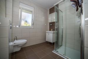 Kúpeľňa v ubytovaní Apartments Kati