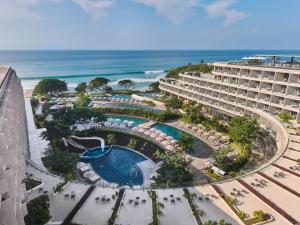 an aerial view of a resort with a pool and the ocean at Dreams Bahia Mita Surf and Spa - All Inclusive in Punta Mita