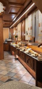 a large kitchen with alot of food on the counters at Wider Apartment UG mit Tageslicht in Gottmadingen