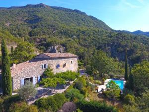 an external view of a house in a mountain at Le Serre des Granges in Montaulieu