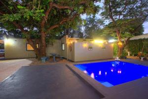 a swimming pool in the backyard of a house at Baobab at 36 Rissik in Komatipoort