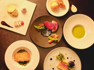a group of plates of food on a table at BLANC yatsugatake 2026年4月24日グランドオープン in Hokuto