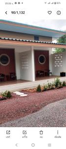 a picture of a building with two windows at DD HOMESTAy หาดสะพลี in Ban Tha Samet (1)