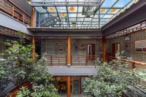 arium of a building with a glass ceiling at Dali Classical Rosewood Boutique Inn in Dali