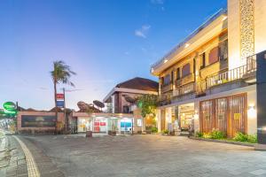 an empty street in front of a building at Nirmala Heritage Hotel in Jimbaran