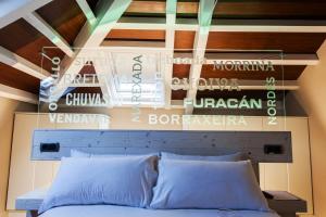 Posteľ alebo postele v izbe v ubytovaní Hotel O Semaforo
