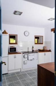 A cozinha ou cozinha compacta de Casa Candelas