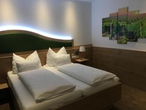 Voodi või voodid majutusasutuse Seminarhotel Daniels toas