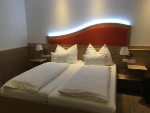 Voodi või voodid majutusasutuse Seminarhotel Daniels toas