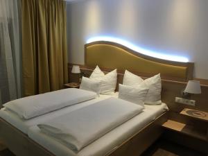 Voodi või voodid majutusasutuse Seminarhotel Daniels toas