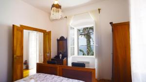 Postel nebo postele na pokoji v ubytování Villa Agnes + 29 fotografií