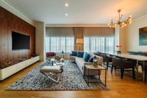 a living room with a couch and a table at Hyatt Regency Trinidad in Port-of-Spain