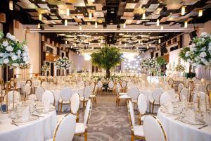 a banquet hall with white tables and chairs at Hyatt Regency Trinidad in Port-of-Spain +82 photos