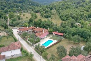 an aerial view of a house with a swimming pool at Baba Stana Houses in Apriltsi +33 photos