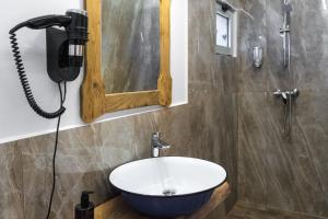 a bathroom with a sink and a shower at ISSA Village in Turda +28 photos