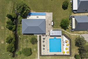 an overhead view of a building with a swimming pool at Chalet #36 The Perfect View in Stevensville