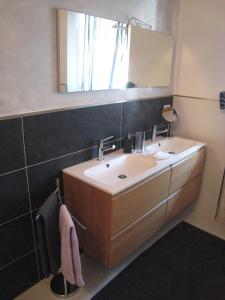 a bathroom with a sink and a mirror at B&B AI PELLEGRINI in Villa Santina +67 photos
