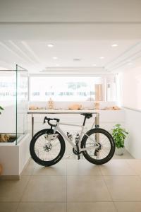 a bike on a stand in a room at Helios Mallorca Hotel & Apartments in Can Pastilla