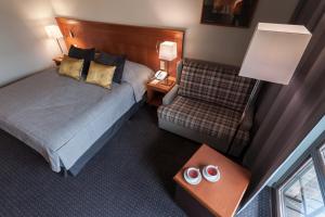 Postel nebo postele na pokoji v ubytování Hotel SPA Dr Irena Eris Wzgórza Dylewskie