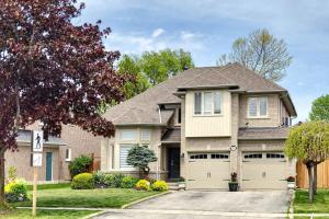a house with a garage at The Boxwood Executive Suite in Markham