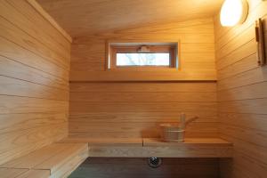 a small sauna with a sink and a window at TinyCabinTATEGU#01 - Vacation STAY 04108v in Miyota +83 photos
