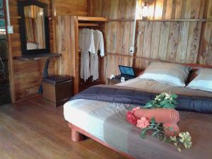 Postel nebo postele na pokoji v ubytování Friendly Koh Jum
