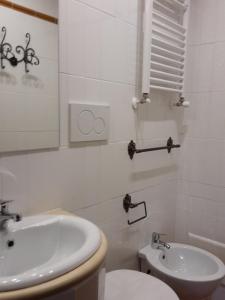 Koupelna v ubytování Hotel 4 Coronati