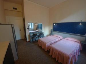 Postel nebo postele na pokoji v ubytování Hotel Ada + 37 fotografií