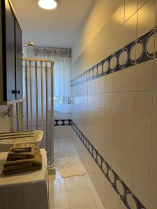 a bathroom with a sink and a mirror at Domus Relax in Battipaglia