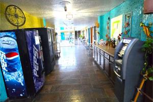 a hallway with two soda machines in a room at Sands Inn & Suites Lake Havasu City in Lake Havasu City