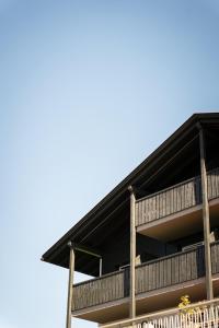 a building with a black roof at Hotel Belvedere - Fine Dining, Hideaway & SPA in San Genesio Atesino +119 photos