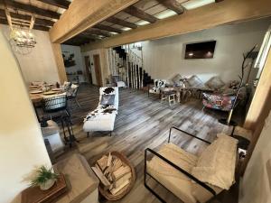 an aerial view of a living room and dining room at Cuibul Braneanului in Bran