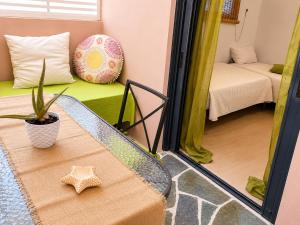 a room with a star sitting on a table at Votsalon Beach House - 30 meters from Alykes Beach in Katastárion +30 photos