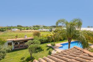 an aerial view of a house with a swimming pool at Villa Santa Susanna 18 in Santa Susanna