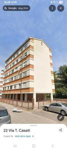 a building with a car parked in front of it at Ca Teresa 14 in Marghera
