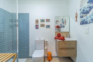 a bathroom with a toilet and a sink and a shower at Beau studio dans mas provençal in Avignon +50 photos