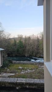 a view of a river from a window at Apartment 42 in Ljubuški