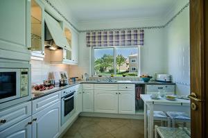 Kuchyň nebo kuchyňský kout v ubytování Luz casas- 44 Fairview village Boavista