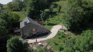 an aerial view of a house in a field at Chez Rose-Laure in Grandviala +12 photos