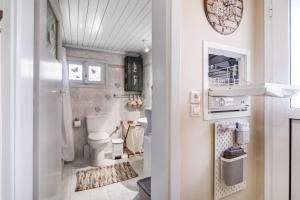 a bathroom with a toilet and a sink at Ancient Corinth Guest House in Korinthos +50 photos