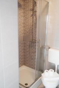 a bathroom with a shower and a toilet at LAVANDLA in Nerezine +14 photos