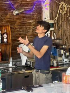 a man standing in a kitchen with his hands at Camping Dias in Gythio