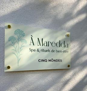 a sign for a marketoda spa and trinketsdiscben offer zinc monkeys at Bella Vista Hôtel, Spa & Gastronomie in Porticcio +273 photos