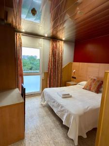 Katil atau katil-katil dalam bilik di Hostal Milenium