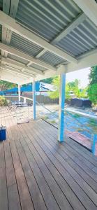 a covered deck with a table and chairs on it at Perth property - Heritage Charm Meets Modern Ease close to all amenities including Midland Hospital in Midland Junction