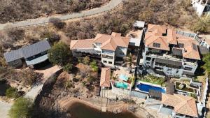 an overhead view of a house with a swimming pool at Khenjadji at Fish Eagle Bay in Bela-Bela