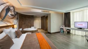 TV/Unterhaltungsangebot in der Unterkunft B Business Hotel & Spa