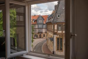 a view from a window of a street and buildings at Goslar LIVING 1 - Modern & Zentral in Goslar
